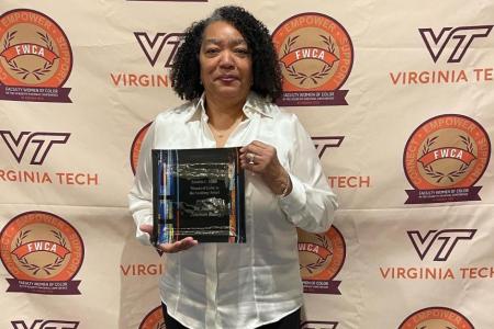 Johnson-Bailey accepts Zenobia L. Hikes Award, 2022